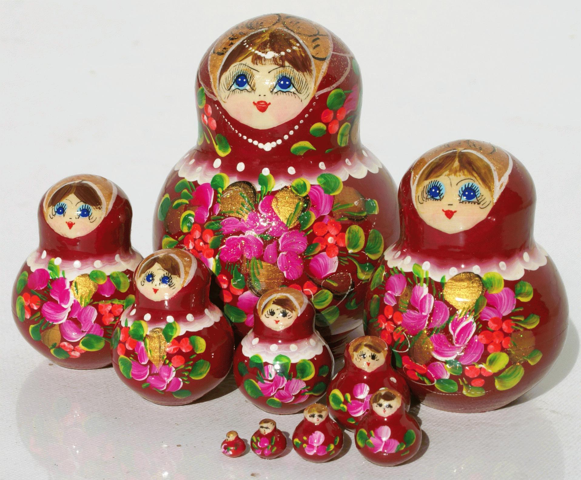Nesting Dolls with Red Floral Design